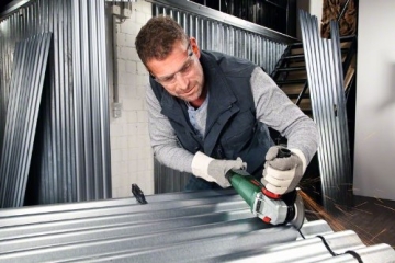 Bosch PWS 1300-125 CE Winkelschleifer + Koffer 