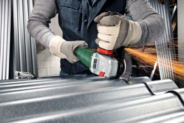 Bosch PWS 1300-125 CE Winkelschleifer + Koffer 
