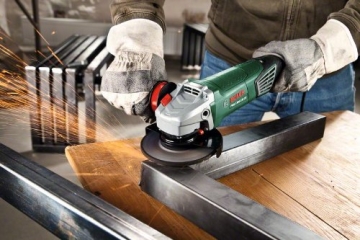 Bosch PWS 1300-125 CE Winkelschleifer + Koffer 