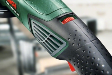 Bosch PWS 1300-125 CE Winkelschleifer + Koffer 